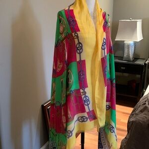 Scarf with many bright colors. No label, feels like wool.